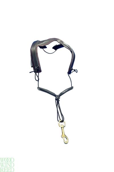 Sling Marmaduke feather strap iv, over shoulder  leather yoke, easy y adjuster on cord, brass hook.